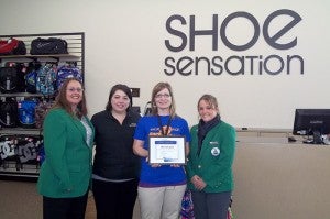 Ambassadors from the Albert Lea-Freeborn County Chamber of Commerce welcome new manager Karla Tukua from Shoe Sensation to the chamber. --Submitted 