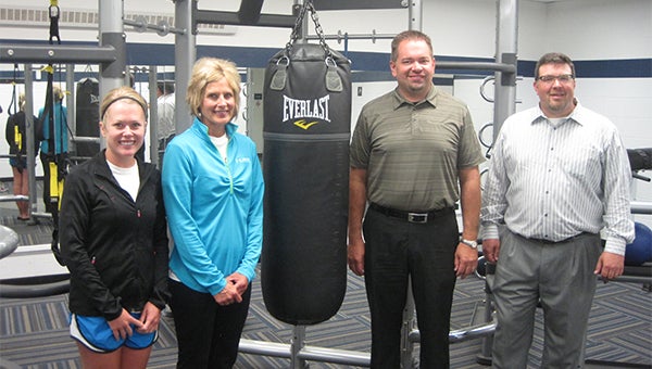 The Albert Lea Family Y was able to purchase a new piece of equipment called Synergy 360 Wednesday for group training because of donations from area individuals. From left are Brittni and Jane Lair, Troy Irvine and Alex Johnston. Others who made contributions were Loren Lair of Lair Farms, Kristine Irvine, Brad Ahrens, Angie Johnston and Mark and Terry Stadheim. — Submitted 