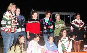 Participants of the 3 o’clock hour dress up time pose for a photo for Relay for Life workers. The theme of the hour was ugly sweaters. -- Erin Murtaugh/Albert Lea Tribune