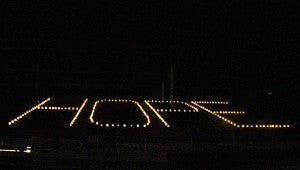 “Hope” is spelled out in the seats of the Grandstand of the Freeborn County Fairgrounds on Friday night during the Freeborn County Relay for Life. -- Erin Murtaugh/Albert Lea Tribune 