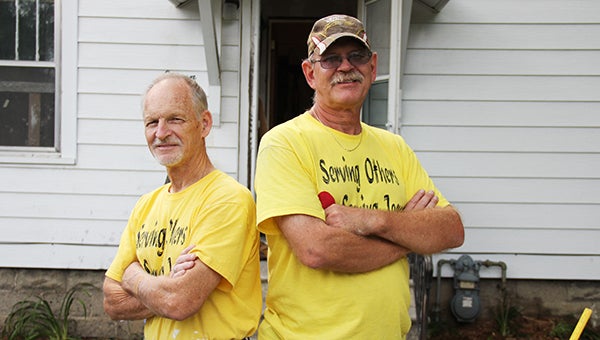 Wayne Applegate, left and Michael Nelson have been volunteering at a home on James Avenue in Albert Lea for Rocking the Block, a collaborative project to fix up homes in the area. --Kelli Lageson/Albert Lea