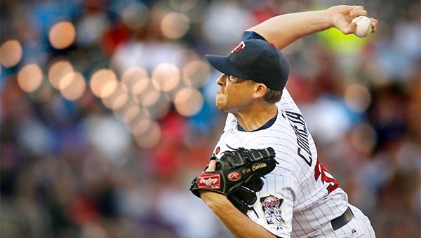Minnesota Twins starting pitcher Kevin Correia delivers a pitch against the Chicago White Sox at Target Field in Minneapolis on Friday. — Brian Peterson/MCT