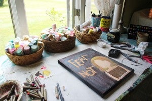 A work in progress is laid out on Kelly Gau’s table in her studio in Lake Mills.