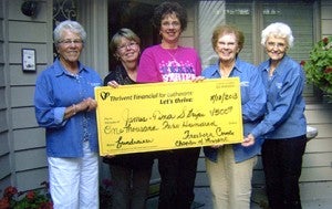 The Freeborn County chapter of Thrivent board members Nancy Ver Hey, Jo Ann Haroldson and Joyce Fredin present a $1,500 supplemental funding check from Thrivent Financial for Lutherans to Tina Stripe and Sandy Petersen, fundraiser chairperson for the James and Tina Stripe fundraiser on June 21.