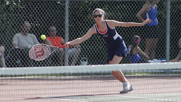 Claire Ellis of Albert Lea swings at the ball during a No. 2 singles match Thursday against Owatonna. The Tigers were swept 7-0 at home. Next, Albert Lea plays at Faribault at 4:30 p.m. Tuesday. Complete results are in today's scoreboard. — Micah Bader/Albert Lea Tribune