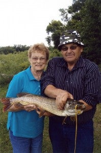 Dorothy Krueger of rural Albert Lea stands with her husband, Nordean, after she caught a 31-inch northern pike on Leech Lake. — Submitted   