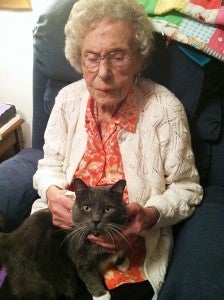 Helen Modderman sits with a cat she grew to like, even though she previously never liked cats. -- Submitted