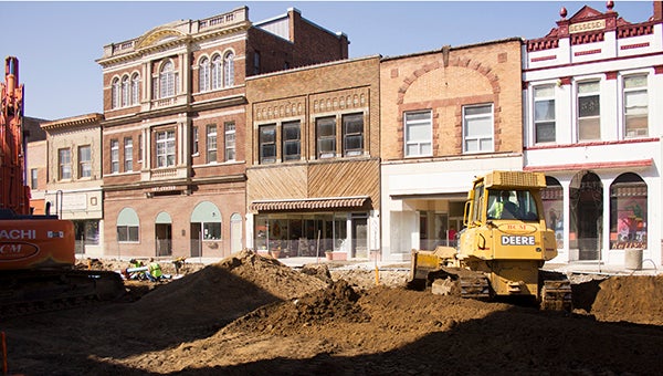 Construction crews work Friday on the reconstruction of Broadway between William and Main streets. Street and sidewalk reconstruction is slated to be completed by the beginning or middle of October. -- Sarah Stultz/Albert Lea Tribune