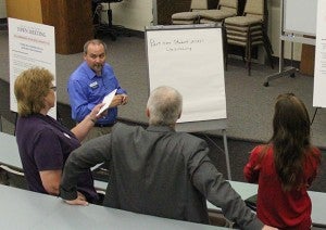 Small groups discuss ways to improve Riverland Community College in Albert Lea during a workshop Wednesday. --Kelli Lageson/Albert Lea Tribune