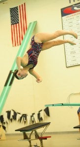 Brianna See-Rockers of Albert Lea competes in the 1-meter diving event Thursday as the Tigers defeated Owatonna 91.5-89.5. — Micah Bader/Albert Lea Tribune