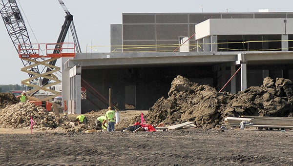 Construction workers are seeing progress at the new school building in Wells. They hope to have the school ready by the start of the 2014-15 school year for United South Central. -Kelli Lageson/Albert Lea Tribune