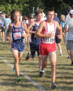 Jackson Goodell, left, and Caleb Troe of Albert Lea run Friday during a cross country meet at Faribault. Goodell earned 32nd place, and Troe took 52nd. — Lon Nelson/For the Albert Lea Tribune