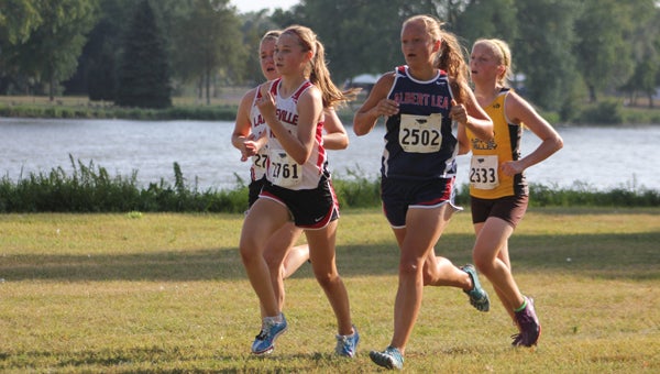 Emma Behling of Albert Lea runs during a cross country meet Friday at Faribault. Behling led the girls' squad with a 25th place finish. — Lon Nelson/For the Albert Lea Tribune  