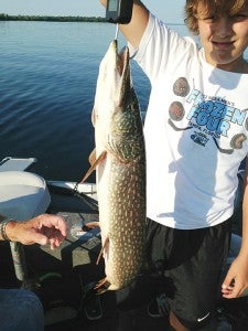 Bergan Lundak of Albert Lea, 14, caught a 34-inch, 8-pound northern pike on Lake Winnibigoshish with a blue and orange Rapala lure. — Submitted 