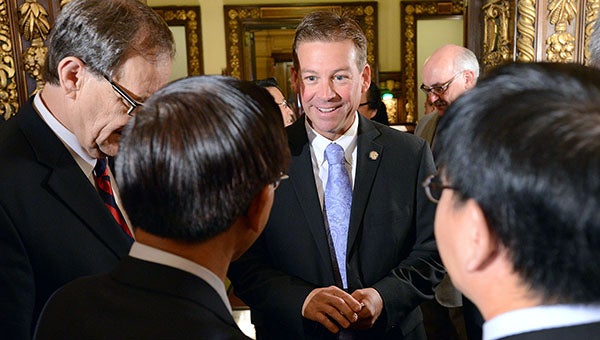 Sen. Dan Sparks, DFL-Austin, on Friday talks with representatives of the Taiwan Agricultural Trade Goodwill Mission. The group formalized a letter of intent to purchase $3.5 billion in U.S.-grown soybeans and corn over the next two years. -- Submitted