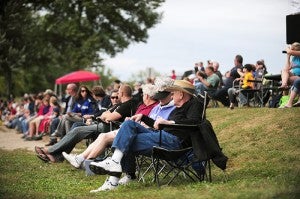 Spectators from the Midwest, including Bill and Donna McDermott of Waterloo, Iowa, watched the action Saturday from the north shore of Fountain Lake.