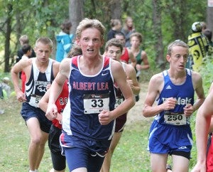 Jay Skaar of Albert Lea runs Saturday at the Jim Flim cross country meet at Winona. The Tigers took fourth place out of 16 teams. — Lon Nelson/For the Albert Lea Tribune 