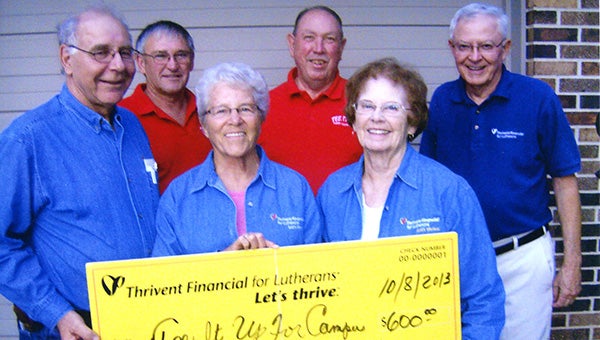 Freeborn County board members Gary Hunnicutt, Nancy Ver Hey, Jo Ann Haroldson and Neil Pierce present a check of $600. From Thrivent Financial supplemental funding to Jim Beach and Shorty Jensen committee members for Camp Courage’s Tee It Up for Campers on July 13 at Oak View Golf Club.