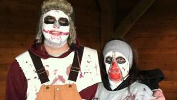 Volunteer Andrew Irvine and Amanda Weiss, United Way of Freeborn County marketing and communications specialist, helped at the 2012 Haunted Walk. --Submitted