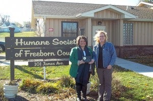 An Albert Lea-Freeborn County Chamber of Commerce Ambassador welcomes the Humane Society of Freeborn County to the chamber. --Submitted