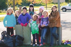Three Girl Scout troops participated in a council-wide project. Each troop chose a location to clean up garbage and rake leaves. It is a campaign to help the community clean up and make everyone aware of making sure leaves and debris do not get into the lakes as this causes algae. Pictured above are troop Nos. 40208 and 40220, who cleaned up at Grace Lutheran Church. -- Submitted