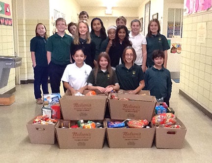 A food drive at St. Theodore Catholic School for Nelson’s Stuff-A-Truck collected 574 items. --Submitted