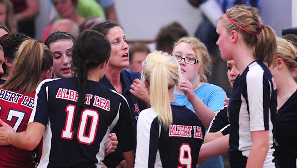 Lisa Deyak, head coach of the Albert Lea volleyball team, talks to her team during a timeout at United South Central. The Tigers fought back from a 2-0 deficit to beat the Rebels 3-2. — Micah Bader/Albert Lea Tribune
