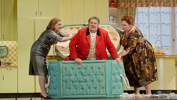 Jennifer Johnson Cano as Meg Page, Ambrogio Maestri in the title role, and Stephanie Blythe as Mrs. Quickly in Verdi’s “Falstaff.” --Ken Howard/Met