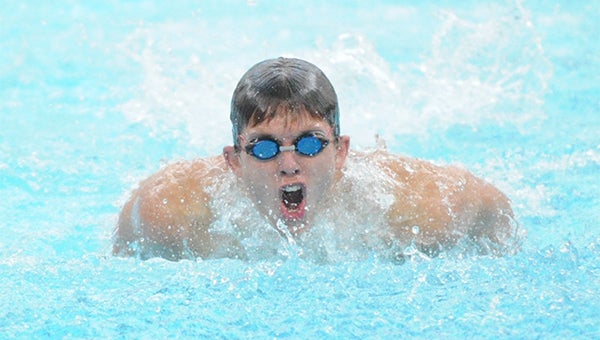Preston Smith swims in the Tiger Relays on Saturday at Albert Lea High School. Smith, Derek Wagner, Daniel Gould and Larry Holcomb took fifth place in the 200-yard medley relay with a time of 1:48.19. — Drew Claussen/Albert Lea Tribune  