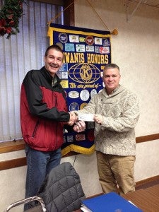 The Albert Lea Daybreakers Kiwanis recently made a donation to the Albert Lea Family Y’s Youth Fund Drive. Pictured is President Mike Funk, right, presenting the donation to Dennis Dieser, executive director of the Y.   --Submitted