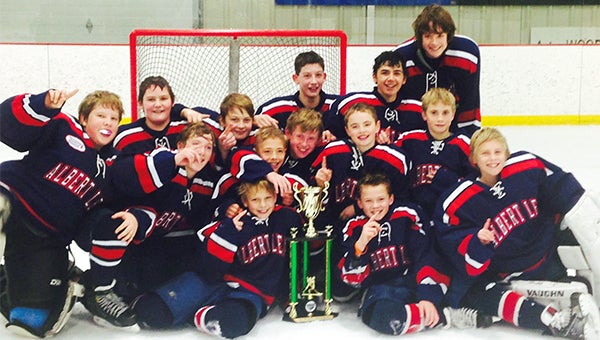 The Albert Lea Class A Pee Wee hockey team won the a tournament at Chippewa Falls, Wis. last Sunday. Albert Lea defeated Arrowhead Region from Wisconsin 7-2 to win the championship. Front row from left are Max Pleimling and Carson Goodell. Middle row from left are Jaxson Heilman, Cole Wentzel, Culley Larson, Jack Edwin, Danny Chalmers and John Jensen. Back row from left are Colby Peterson, Ian Ball, Joe Deyak, Karter Kenis and Jaeger Classon. — Submitted