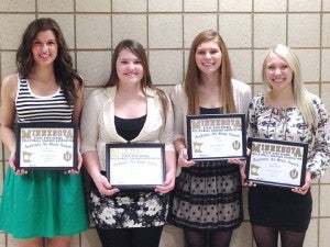 Four members of the Albert Lea volleyball team earned All-State academic honors at the team banquet Nov. 18. From left are Annie Ladwig, Haley Schroader, Sydney Rehnelt and Bryn Woodside. Seniors with a cumulative GPAs of 3.8 or higher are considered. The Tigers also earned the Gold All-State team academic award with an overall team GPA of 3.91. — Submitted