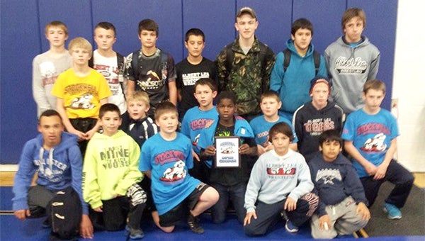 The Albert Lea junior high wrestling team competed in the eight-team Stockwell Invitational Dec. 7 at Owatonna. The Tigers defended their title by accumulating 350 team points. Northfield and Owatonna tied for second place with 262 points. Albert Lea’s individual champions were Jake Johnsrud, Joey Flores, Nic Cantu, Zechariah Livingston, Brody Nielsen, Zach Glazier, Ty Harms, Drake Bullis and Hunter Lowman. Front row from left are Logan Donovan, Flores, Mason Rogert, Joseph Peterson, Cantu and Christian Leal. Middle row from left are Will Smith, Bullis, Bryan Bell, Garrett Grandstrand and Livingston. Back row from left are Harms, Johnsrud, Glazier, Nielsen, Jessie Hernandez, Nielsen, Steven Larson and Lowman. — Submitted
