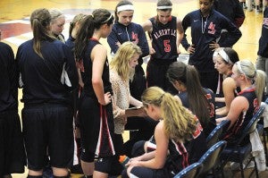 Albert Lea girls’ basketball head coach Lindsey Hugstad-Vaa instructs her team Friday during a timeout in the second half against Rochester Mayo. — Micah Bader/Albert Lea Tribune   