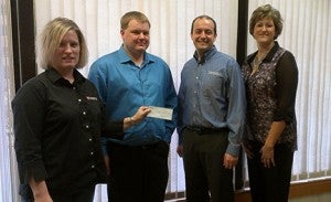 Freeborn County Jaycees donated $250 toward a new soccer complex. Pictured from left are Stephanie Schneider, soccer board member, Andy Bernau, Mark Heinemann and Heather Janzig, all members of the Jaycees. --Submitted