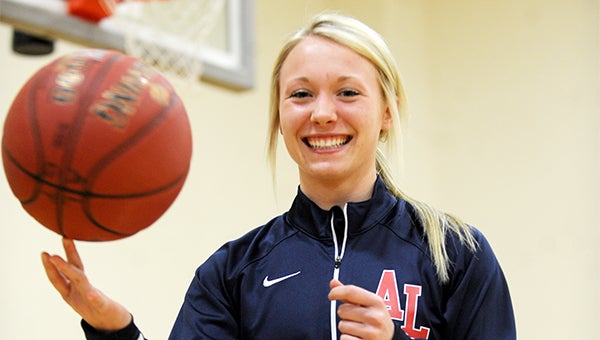 Albert Lea point guard Bryn Woodside spins the ball on her finger Tuesday at Albert Lea High School. Woodside passed the scoring milestone of 1,000 points Monday at Waseca. — Micah Bader/Albert Lea Tribune