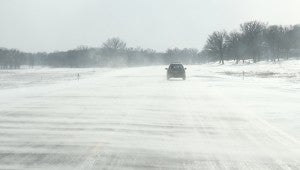 Snow blows across U.S. Highway 69 between Twin Lakes and Emmons on Thursday afternoon, limiting visibility.