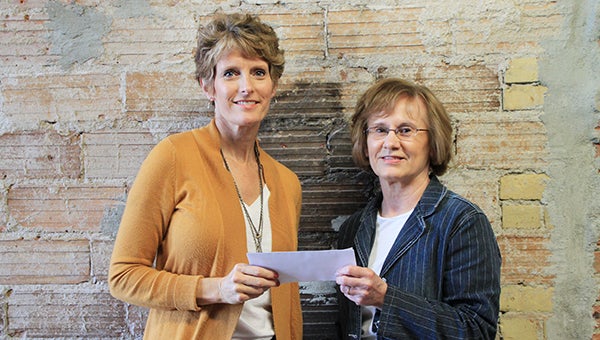 Freeborn County Communities Foundation chairwoman Jill Peterson, left, stands with Jo Lowe of the Arc of Freeborn County. --Submitted
