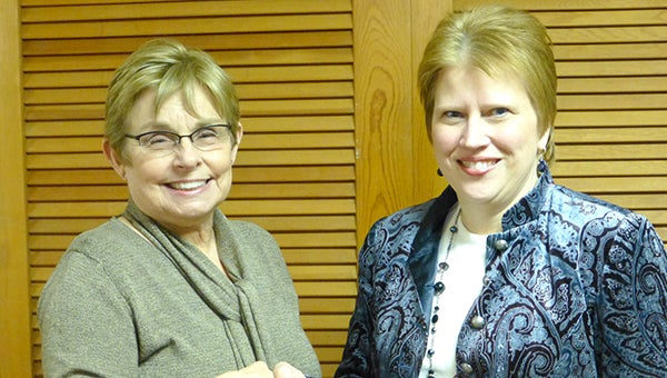 Carolyn Smith, left, handed over her position as coordinator to Mary Jo Volkman during a board meeting on Jan. 13.  --Submitted