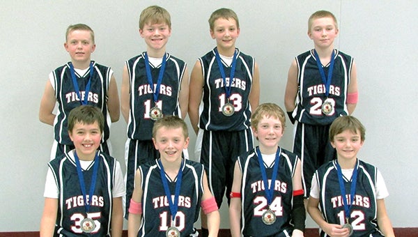 The Albert Lea sixth-grade boys’ basketball team took second place Jan. 25 in a tournament at Waseca. The Tigers beat New Prague 35-19 and Waseca 27-19. Waterville-Elysian-Morristown beat Albert Lea 42-32 in the championship. Front row from left are Andrew Willner, Caden Gardner, Logan Howe and Trenton Lehner. Back row from left are Caden Reichl, Chase Hill, Connor Veldman and Koby Hendrickson. The team is coached by Steven Lehner. — Submitted