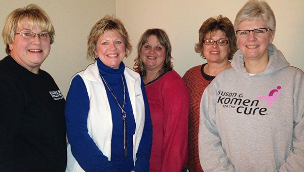 The women who run Kiester for a Cure smile for the camera. From left, they are Linda Willaby, Sheila Chose, Karen Zabel, Rachel Lohberger and Jodi Willaby. -- Julie Seedorf/for the Tribune