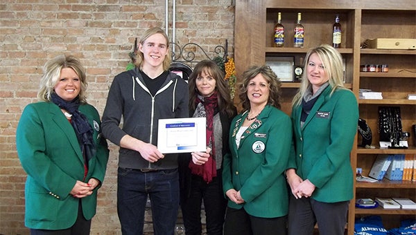 Albert Lea-Freeborn County Chamber of Commerce Ambassadors welcome new owners Lisa Hanson from Prairie Wind Coffee to the chamber. --Submitted