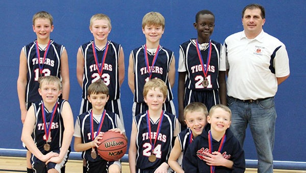 The Albert Lea sixth-grade A team took third place Dec. 16 at its home tournament. Front row from left are Caden Reichl, Trenton Lehner, Logan Howe, Caden Garder and manager Carson Gardner. Back row from left are Connor Veldman, Koby Hendrickson, Trey Hill, Danbil Nhail, and coach Steve Lehner. — Submitted
