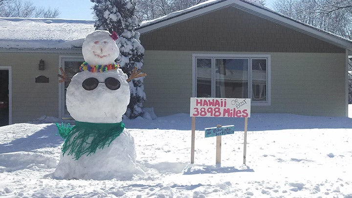 Melissa, Dave, Julia and Evan Doppelhammer submitted this photo of how they found humor during the blizzard this week. It was titled “Hawaii or bust!” --Submitted