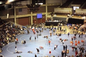 Wrestlers warm up on the mats Friday at the Section 1AA quarterfinals at the Mayo Civic Center in Rochester. — Micah Bader/Albert Lea Tribune  