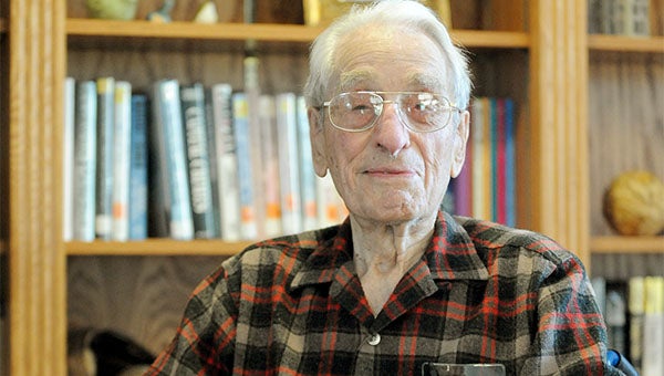LeRoy Maas, a former teacher and wrestling coach at Albert Lea High School, sits in one of his favorite spots on the Good Samaritan Society premises, the library at Hidden Creek Estates, where he resides. --Micah Bader/Albert Lea Tribune