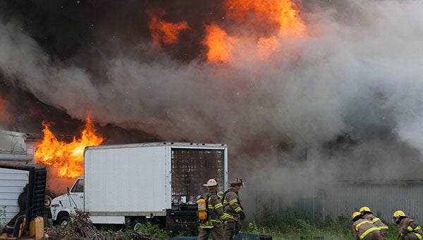 Firefighters from more than 20  departments  respond July 8, 2013, to a blaze in Hollandale. -- Sarah Stultz/Albert Lea Tribune   