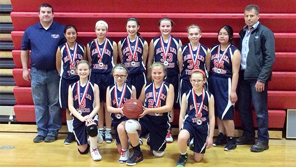 The Albert Lea sixth-grade girls’ basketball team took third place Feb. 16 at a tournament at Farimont. Front row from left are Joci Strom, Alexi Heavner, Sierra Jensen and Kayden Kirchner. Back row from left are coach Tim Butt, Atziri Torres, Samantha Skarstad, Turena Schultz, Ashley Butt, Sydney Nelson, Jazmin Morales and coach David Schultz. — Submitted