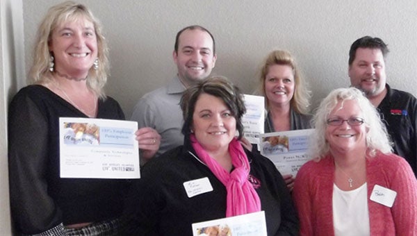 The United Way recently recognized businesses with 100 percent employee participation. Pictured in front are Kim Nelson, left, of The Children’s Center and Beth Birch of U.S. Bank. In back are Gina Frank of Community Technologies & Services, Mark Heinemann of Farmer’s State Bank and Anna Rahn and Jay Paul of Power 96/Hometown Broadcasting. Other companies with 100 percent participation were Adams & Winter, Albert Lea Freeborn County Chamber of Commerce, Americana Insurance, Alliance Benefit Group, American Bank, Home Federal Savings Bank, ISC Financial Advisors, Rofshus Precision Machine, Security Bank, United Employee’s Credit Union, US Bank, and Zenk, Read & Trygstad. --Submitted