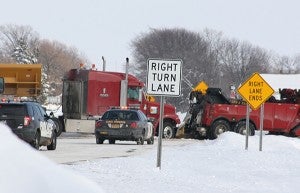 Law enforcement responds to a crash between a semitrailer and a pickup Wednesday afternoon east of Trail’s Travel Center on Freeborn County 46. A minor injury was reported but no one was transported to the hospital. – Sarah Stultz/Albert Lea Tribune